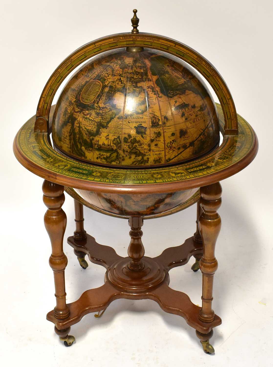 A reproduction drinks cabinet in the form of a terrestrial globe, with hinged lid enclosing a set of - Image 2 of 4