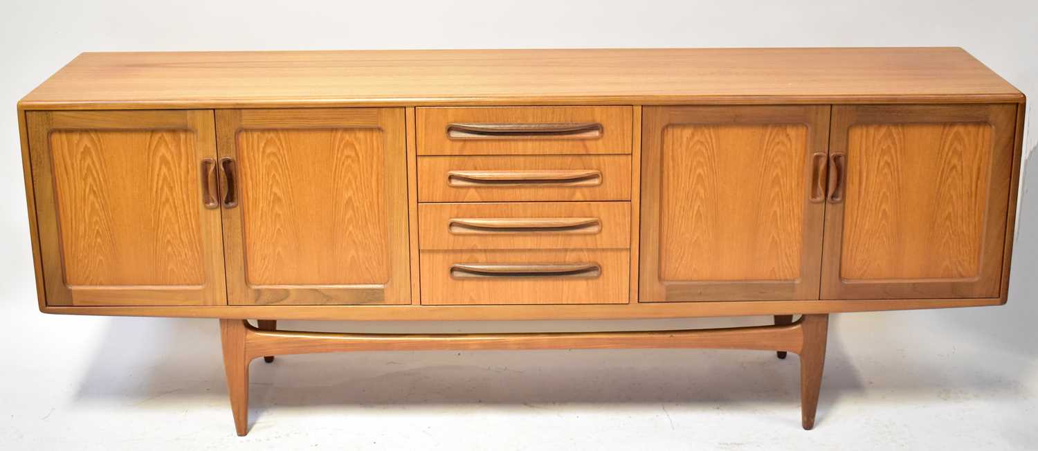 G-PLAN; a 1960s teak sideboard from the Fresco range, the central bank of four drawers flanked by