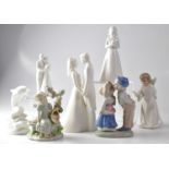 COALPORT; four 'Moments' figures comprising 'With this Ring', 'Amen', 'Our Special Day' and 'Free