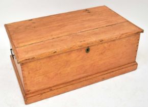 A stripped pine short bedding box with inner candle box, with brass swing handles, 35 x 86 x 51cm.