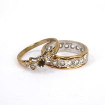 A 9ct yellow and white gold eternity ring set with white stones, and a 9ct gold dress ring with