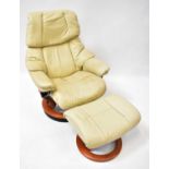 EKORNES; a Stressless beige leather recliner, with matching footstool (2).
