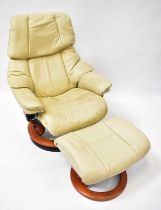 EKORNES; a Stressless beige leather recliner, with matching footstool (2).