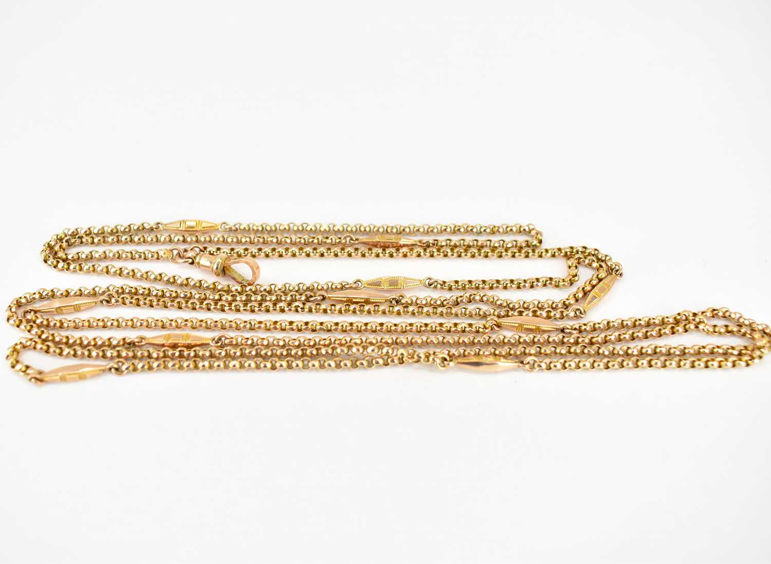 A 9ct rose gold Victorian-style muff chain with belcher links separated with gold lozenge links, - Image 2 of 2