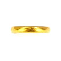 A 22ct gold thin wedding band, size L, approx. 1.9g.