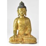 A gilded bronze figure of a seated Buddha, height 39cm. Condition Report: This figure does not sit