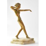 AFTER JOSEF LORENZL (1892-1950); a painted spelter figure of an Art Deco flapper girl, raised on