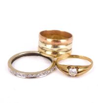 Three 9ct gold rings comprising a three-colour band ring, size H, a 9ct gold small ring with claw