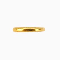 A 22ct gold wide wedding band, size M, approx. 6.5g.