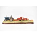 BORDER FINE ARTS; a limited edition figure group 'Hay Baling', model no. B0738, numbered 652/2002,