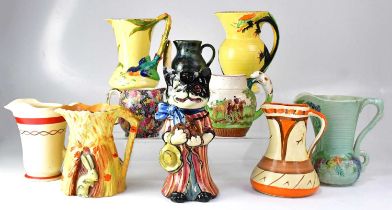 A quantity of decorative jugs including a Royal Winton Grimwades example in the 'Hazel' pattern,