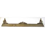 A steel fender with applied gadrooned brass trim and returns, 158 x 40cm. Condition Report: Internal