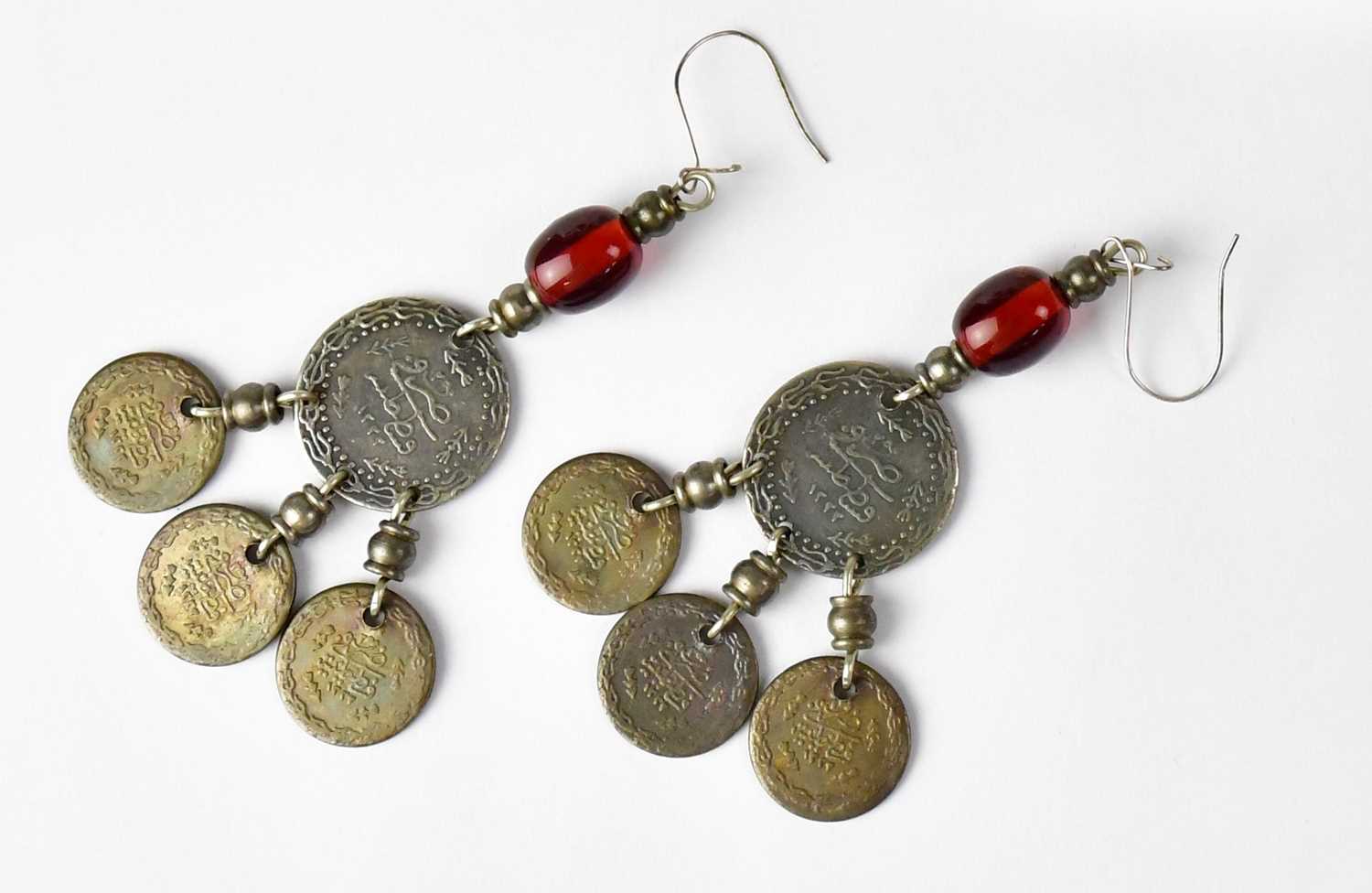 A Turkish cherry amber coloured bead necklace set with five Turkish coins on a white metal chain, - Image 3 of 3