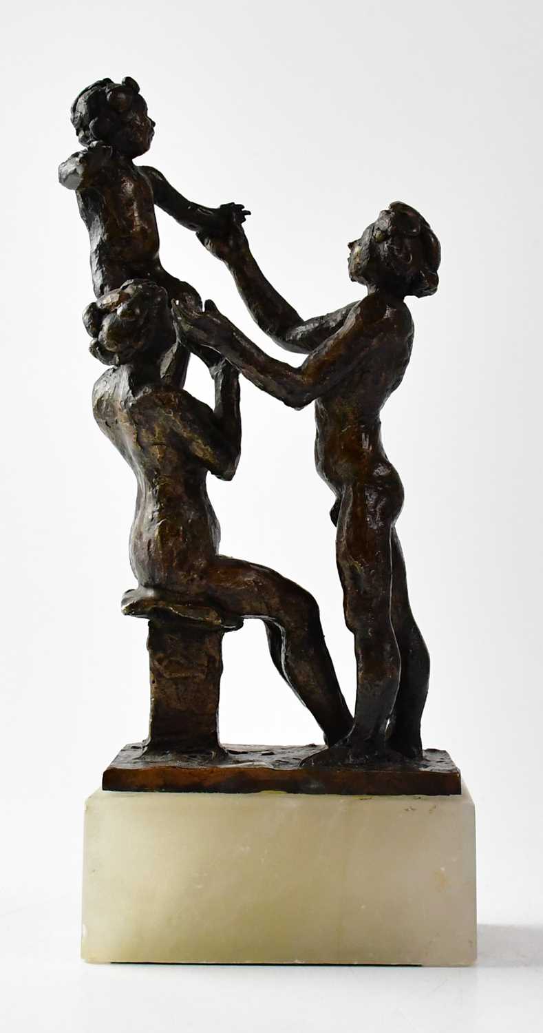 † VINCENT BUTLER RSA, RGI (1933-2017); a bronze figure group of a mother and father playing with