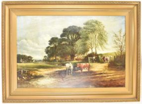 J. SPENCER (British, 19th century); oil on canvas, cattle crossing ford, with trees and buildings to