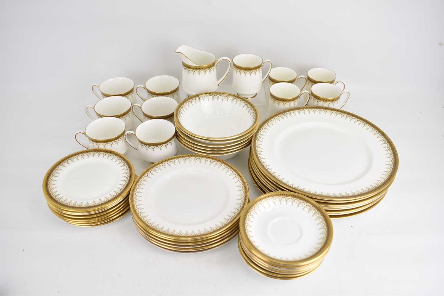 PARAGON; an 'Athena' forty-eight piece part tea and dinner set, white with gilt border, comprising