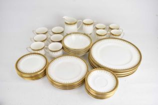 PARAGON; an 'Athena' forty-eight piece part tea and dinner set, white with gilt border, comprising