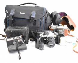 Various vintage cameras and equipment to include a cased Zenit-E, a cased Pentax ME Super, a Box