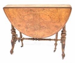 A Victorian burr walnut Sutherland table raised on turned stretchered carved outswept feet to