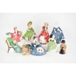 ROYAL DOULTON; a collection of porcelain figures comprising HN1936 'Top o' The Hill', HN2334 '