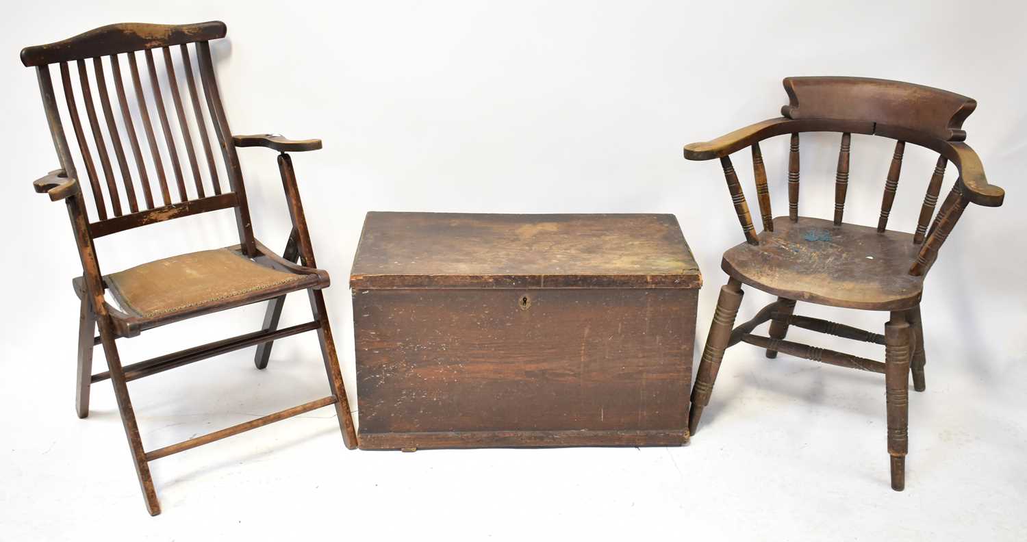 An Edwardian folding rail back chair with studded seat, together with a smoker's bow chair and a