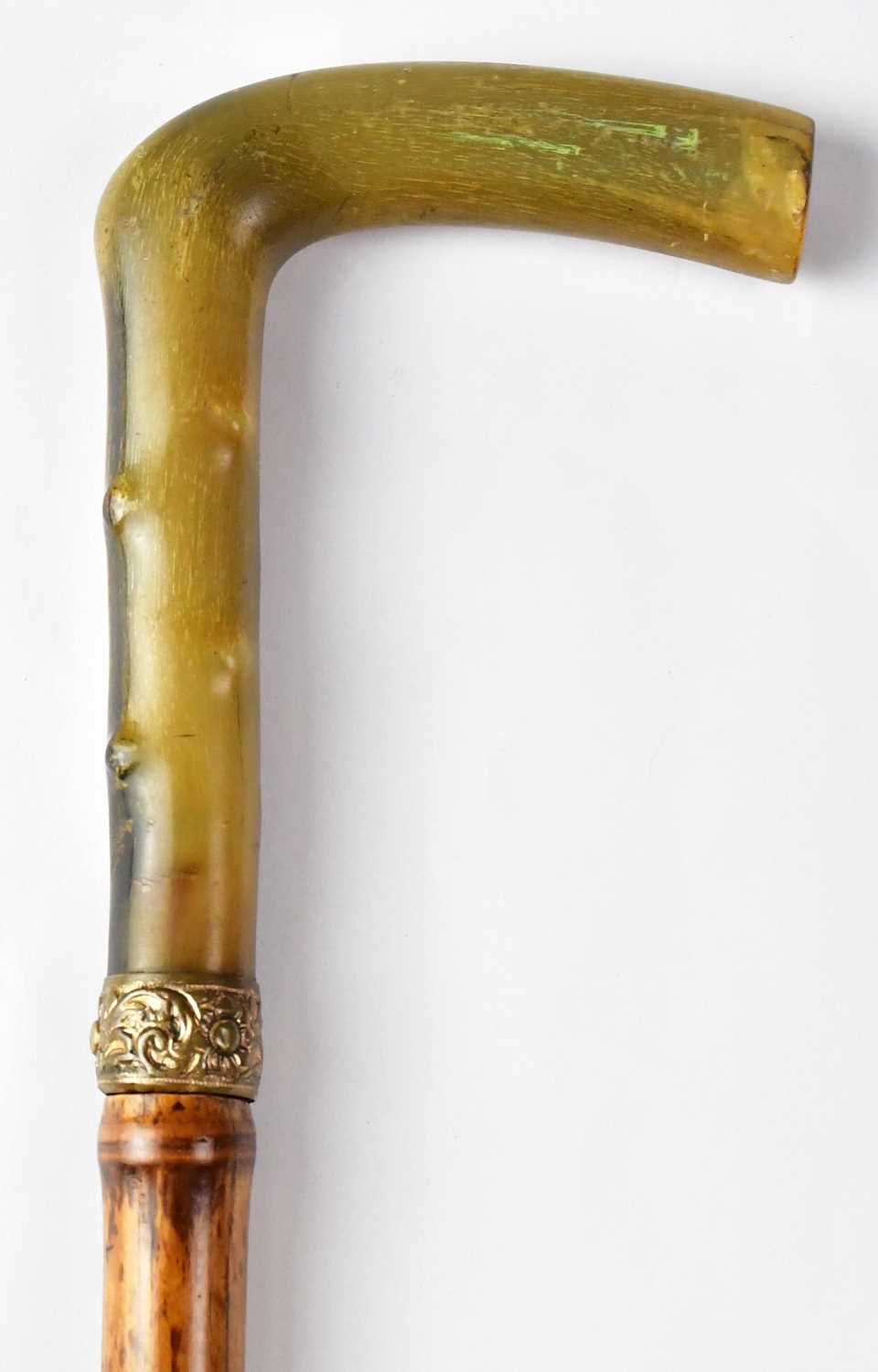 A late 19th/early 20th century bamboo horn-handled sword stick with yellow base metal collar, acid - Image 2 of 2