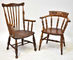 A Victorian smoker's bow-back elbow chair with turned spindles, raised on turned stretchered