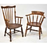 A Victorian smoker's bow-back elbow chair with turned spindles, raised on turned stretchered