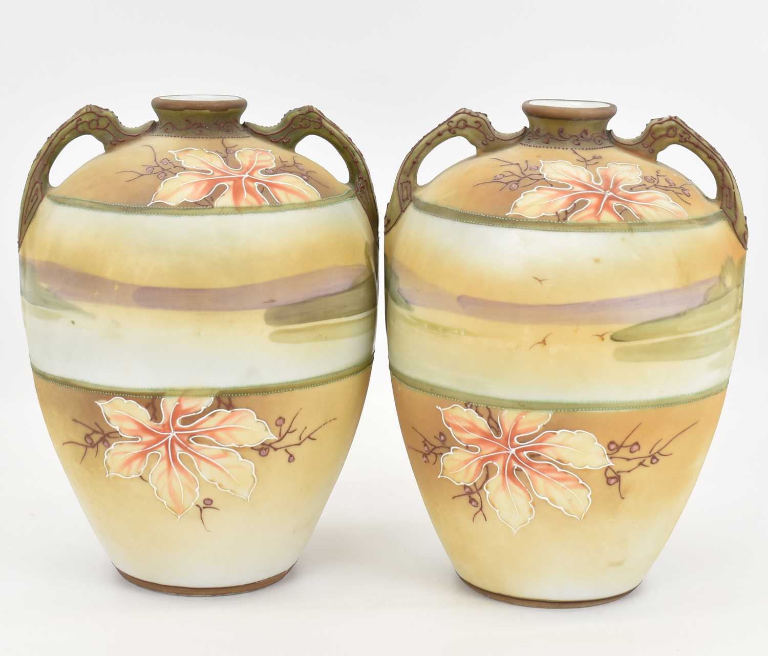 A pair of hand painted Japanese porcelain vases of ovoid form with branch-style handles, a central - Image 3 of 4
