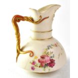 ROYAL WORCESTER; a blush ware jug of squat form with gilt wrythen handle, shape no. 1378, puce