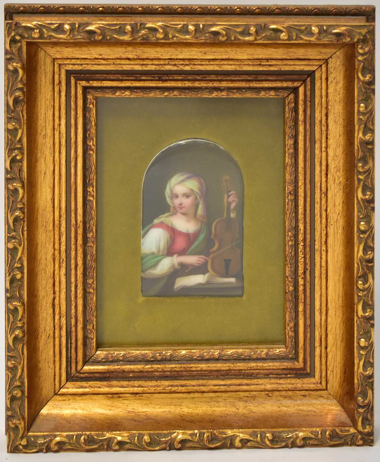 A Berlin-style porcelain plaque, painted with a half-length portrait of a Renaissance-style woman