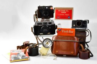 A group of cameras and accessories, to include a Zeiss Ikon Contina L Prontor 250 camera, fitted