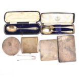 Hallmarked silver items comprising three cigarette cases, small sugar tongs, a Christening spoon and