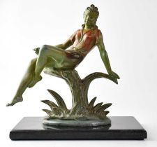 A painted cast metal figure of a young lady sitting on a tree stump, unsigned, on associated black