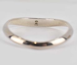 GEORG JENSEN; a sterling silver curve bangle, no. 501, 8cm, approx. 1.54ozt, with cushion and