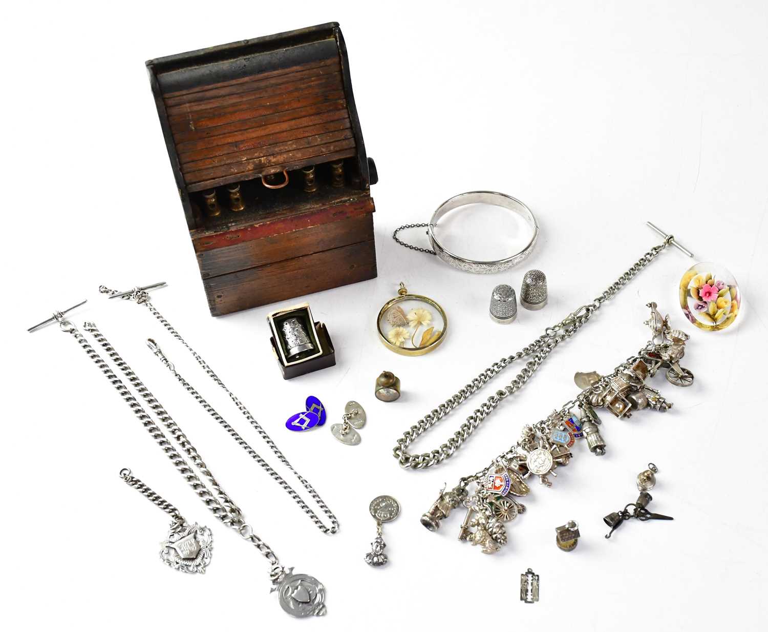 A small quantity of jewellery, to include two hallmarked silver watch chains with T-bar, one set