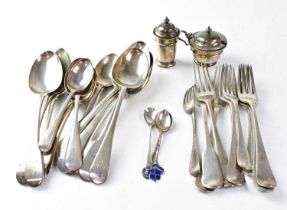 A hallmarked silver salt and pepperette, a quantity of various spoons, and forks, various dates