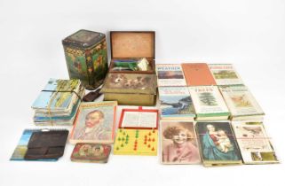 A collectors' lot to include a tin with 'Division One English and Scottish Winners 1900-1926', 16