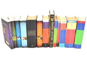 Thirteen copies of various Harry Potter books, including hardbacks and softbacks (13).