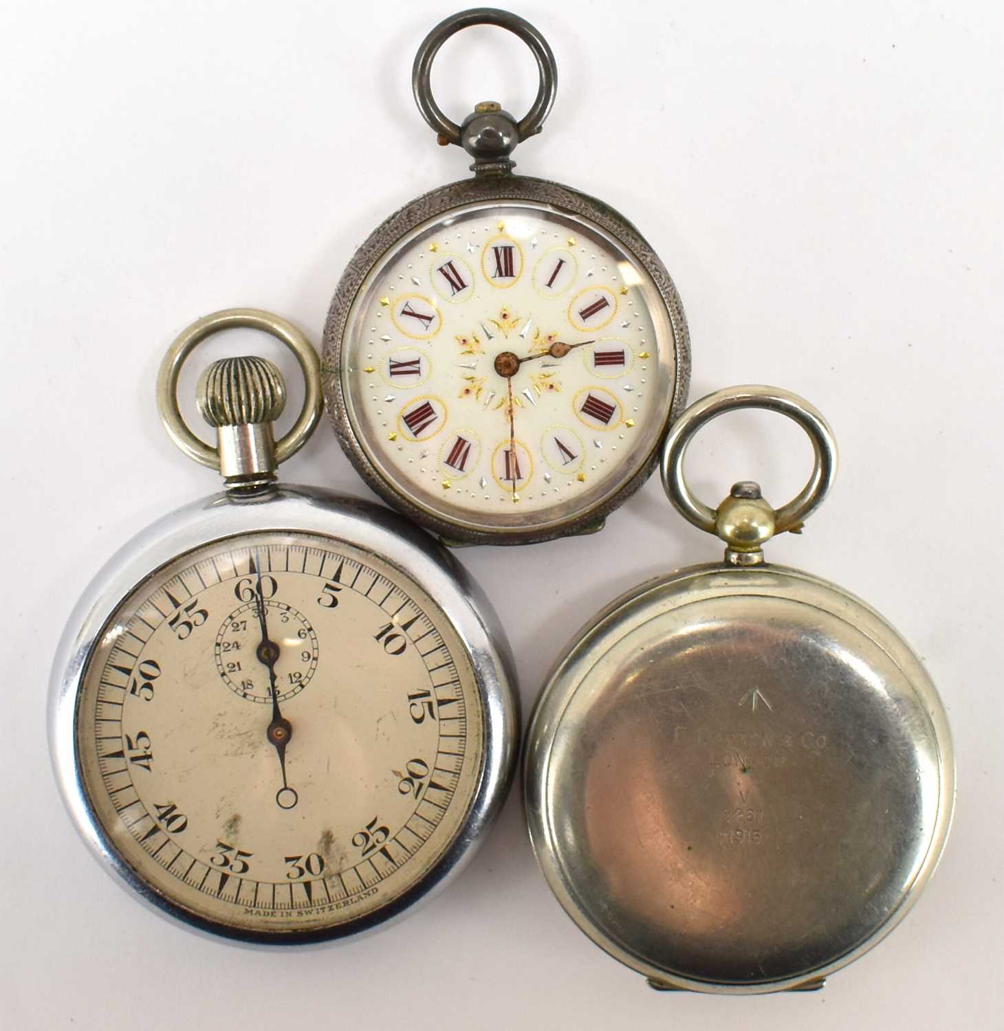 A small hallmarked silver open face fob watch, the white enamelled dial set with Roman numerals