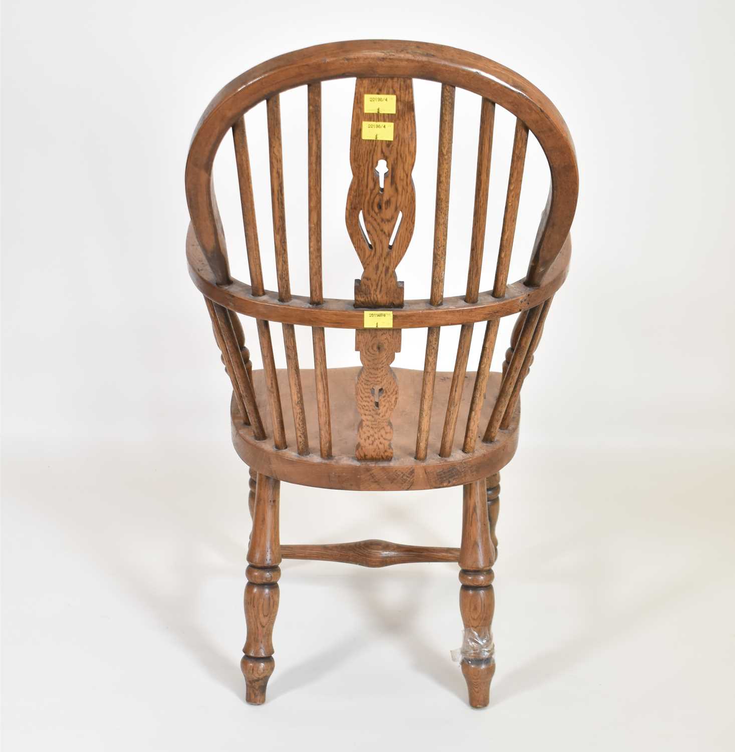 A children's oak stick back Windsor chair, with pierced back splat, 'H' cross stretcher, to turned - Image 2 of 3