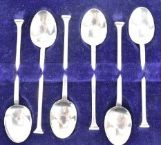 A. J. BAILEY; a cased set of six George V hallmarked silver teaspoons with square seal tops,