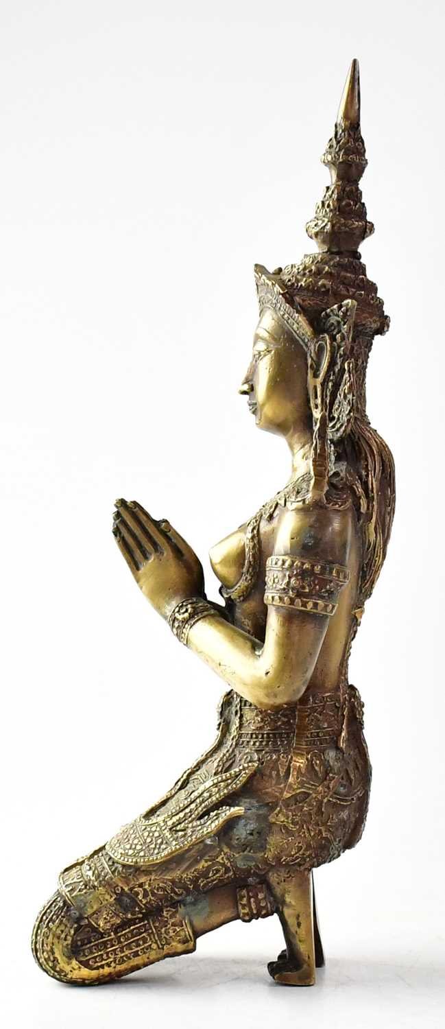 A bronze figure of a Thai temple watcher in the form of a kneeling female figure in ornate dress, - Image 2 of 2