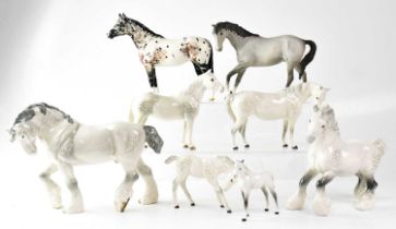BESWICK; eight grey and dappled horses to include an Appaloosa, a shire, shire mare, dappled foal,