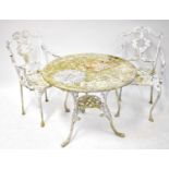 A white painted aluminium circular garden table, 68 x 82cm, and a pair of chairs, in the style of