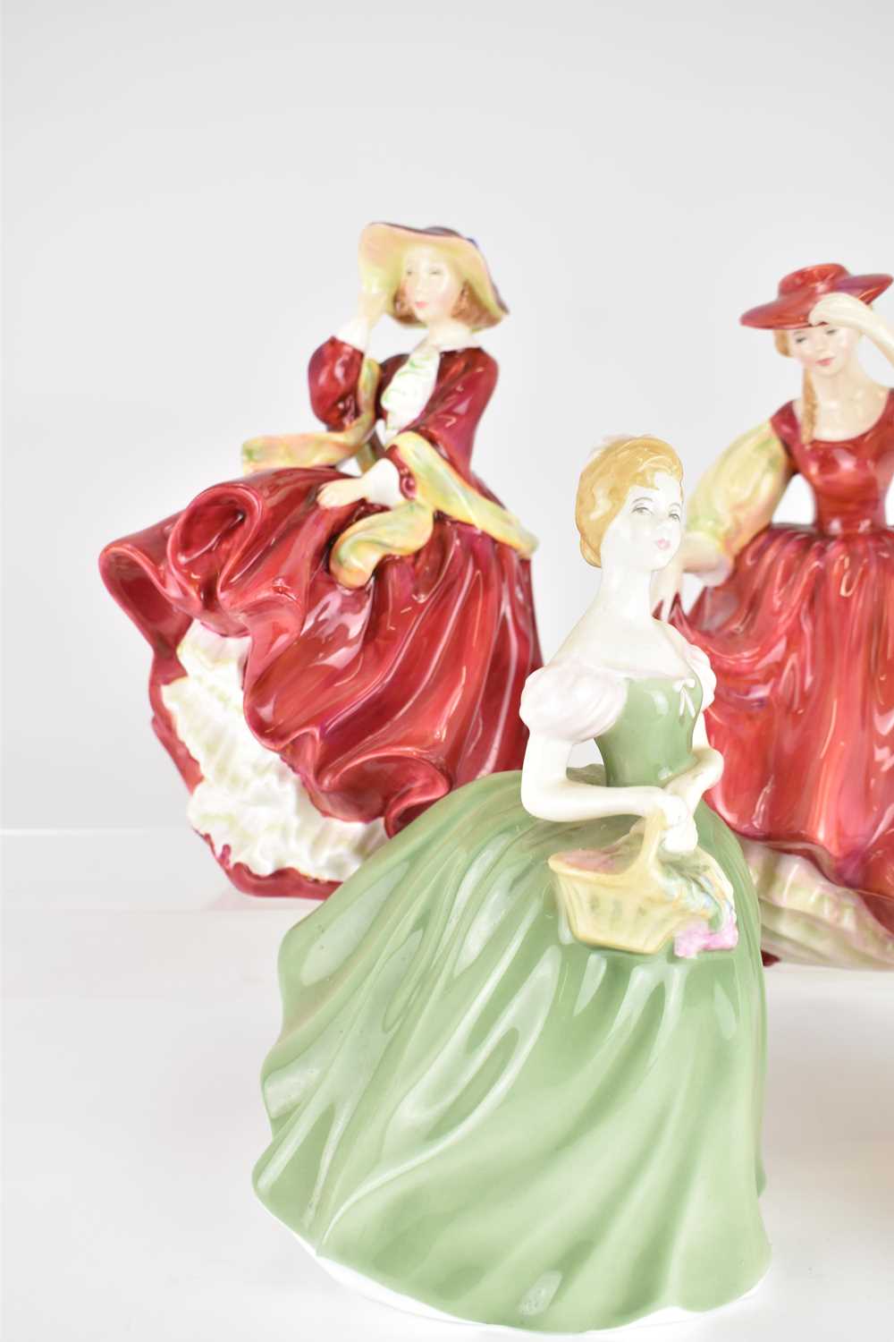 ROYAL DOULTON; four porcelain figurines comprising HN1834 'Top o' the Hill', height 18cm, HN2399 ' - Image 2 of 4