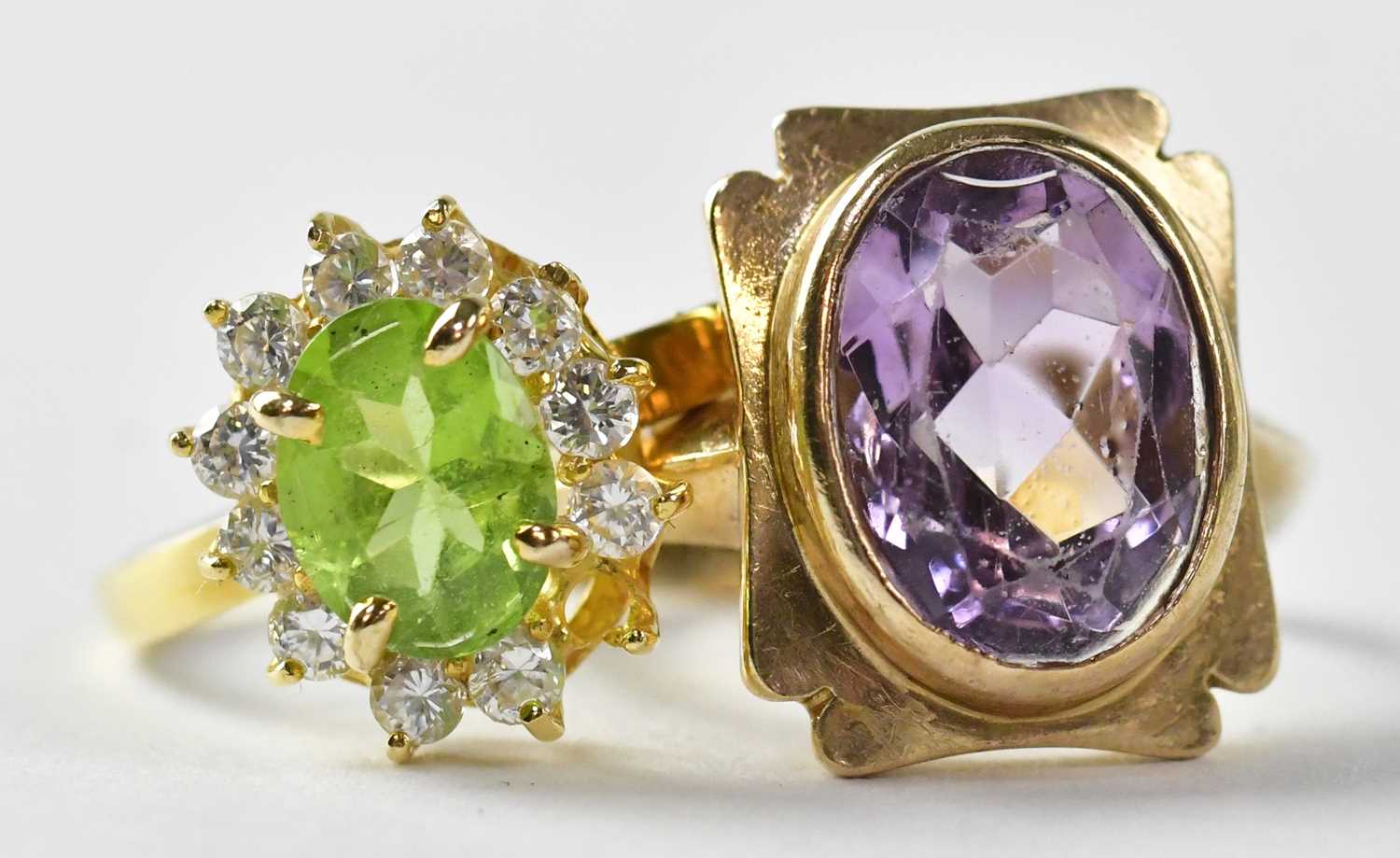 Four dress rings comprising a 9ct gold ring set with amethyst, stamped 375, size M1/2, approx. 4.6g, - Image 3 of 5