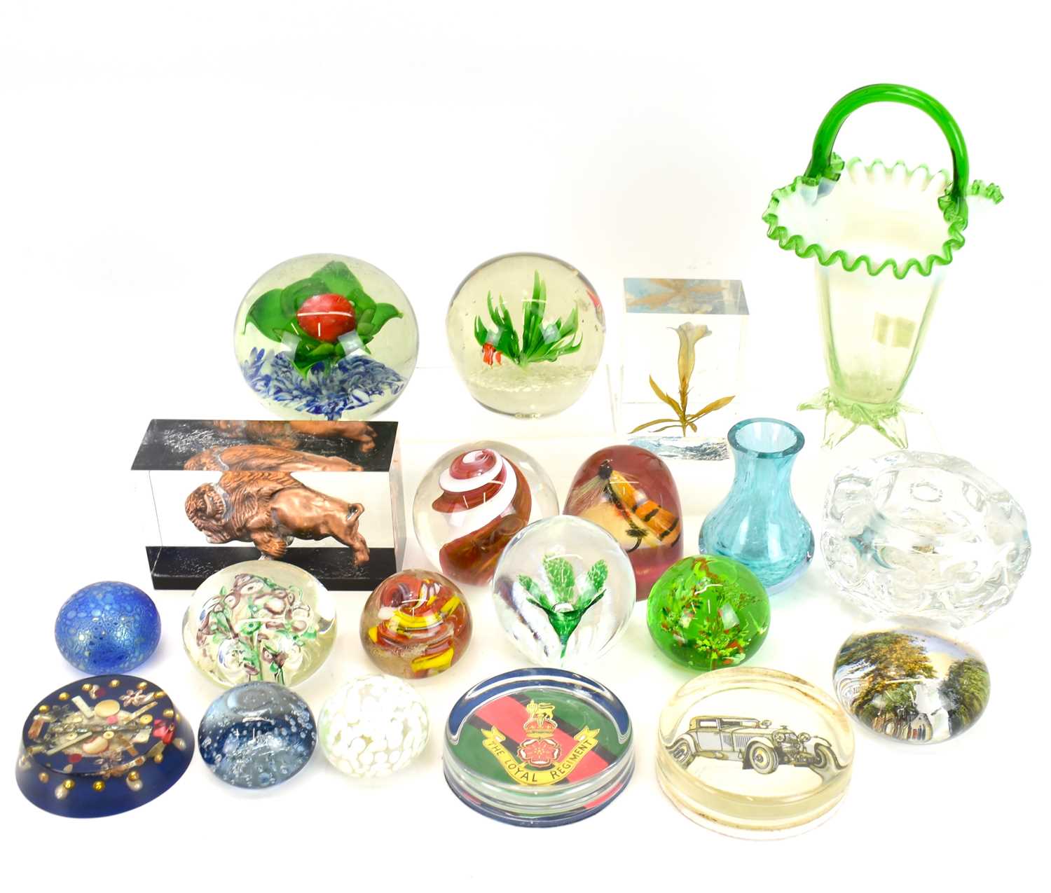 Various art glass paperweights and vases, to include an iridescent finish example, encased flowers