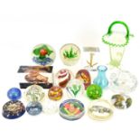 Various art glass paperweights and vases, to include an iridescent finish example, encased flowers