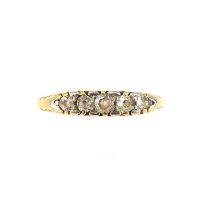 An 18ct gold ring set with five graduated diamonds, size L, approx. 2.5g.